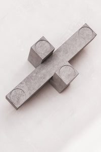 Remembering Carl Andre Candel Holder
