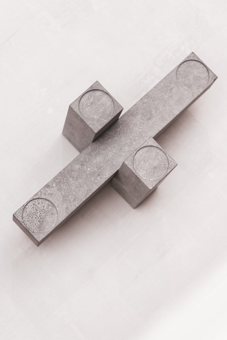 Remembering Carl Andre Candel Holder