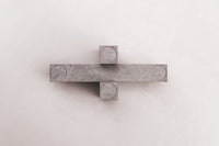 Remembering Carl Andre Candel Holder