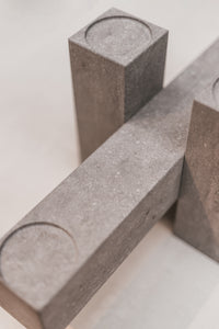 Remembering Carl Andre Candel Holder